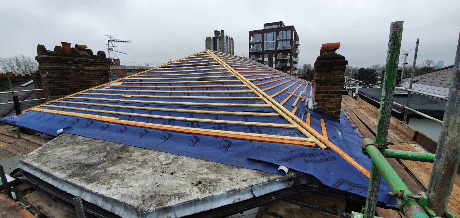 New pitched roof timber battens and breathable membrane installation in London